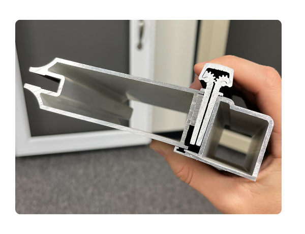 Thick reinforced aluminum frame on Den Defenders security and storm doors designed for superior strength and structural durability
